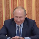 Putin lacht Foto: YouTube Screen